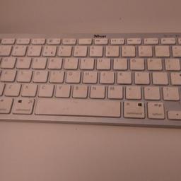 cordless bluetooth keyboard white in colour used only once.