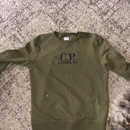 CP COMPANY SWEATSHIRT KHAKI COLOUR, bought for £105, very small mark on front side hence reduced to £50 or nearest offer, no refunds