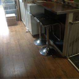 Black chrome bar stools adjustable heights as shown in pictures