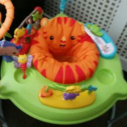 Condition is Used but in excellent condition.

The Fisher-Price Roaring Rainforest Jumperoo is a jungle of fun and adventure! With brightly coloured toys and an adorable smiling tiger seat made of soft, machine washable fabric this interactive jumperoo is sure to give your little one lots of smiles and giggles! The seat can twist a full 360° so your baby can explore all the great toys this cheerful jumperoo has to offer such as smiling blue monkeys, a butterfly, an elephant a hippo and much more