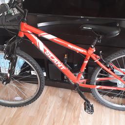 in good used condition. the wheel size is 26inch and the frame size is 14 inch. good bike for a child between the ages of around 9-12 depending on height. everything works as it should. was being used up until this week when my son got a new bike. does have Mark's and signs of use. great for oing back to school on.