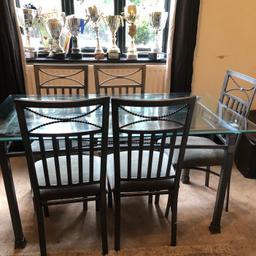 Glass table and 5 chairs free to collector , some slight scratches on the glass and the chairs upholstery needs a clean 

Collection B33,