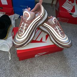 Air 97’s UL’17
Size 7
Rose gold but reflective 
v Good condition 
Come with box