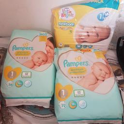 1 unopened pack of pampers ,just over 1/2 pack of pampers, over 1/2 pack of asdas