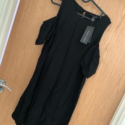 Brand new with tags off the shoulder black dress 
Brought for holiday from new look, never wore it. 
Needs an iron 

Selling cheap as not needed. £2