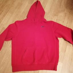 Red, size Xl, 15 yrs. Good condition, front pocket, blue Nike tick. Can post for postage costs.