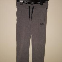Childrens Grey Hugo Boss Tracksuit Pants Age 5. Good condition. Collection only - postage is an additional cost chargeable to buyer.