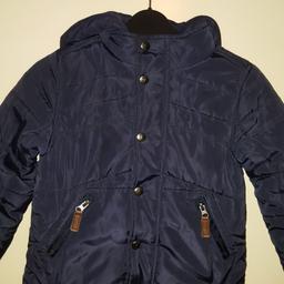Navy Blue Jasper Conran Boys Coat Age 4-5. Excellent condition, hardly worn. Grey Fleece Material inside. Extra warm. Collection only - postage is an additional cost chargeable to buyer.