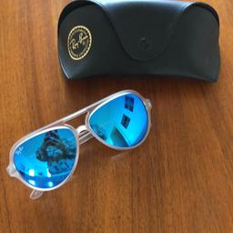 Ray-bans with blue reflective glass. Bought in Miami 2016 and sparsely used.