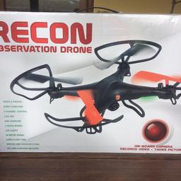 Good condition comes with a usb to download  footage from the drone , few propellers and is gyro stabilised , 4 channel control , 2.4Ghz , USB charging, 3 speed modes ,led lights ,50 metre range ,8 min flight time , indoor and outdoor flying ,SD card and reader included