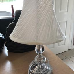 Small touch lamp will do next to bed on bedside cabinet