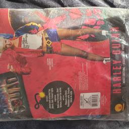 The original Harley Quinn 'Daddy's Girl' costume comes complete with sequence shorts and belt, fishnet tights and jacket with top attached in a Size Small (fit size 6-10).

Never worn except to try on.