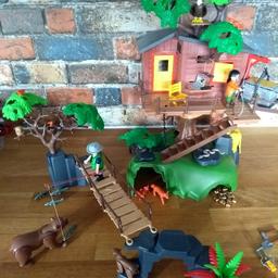 Like new. Includes treehouse, bridge, figures, animals and lots of accessories including gold nuggets.