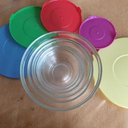 Set of 5 glass storage containers with plastic lids. Hardly used. Different sizes