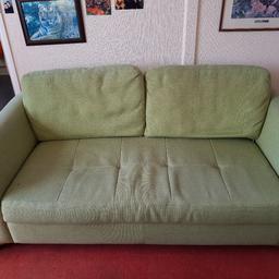 Green cloth sofa , few marks here and there been a comfitable sofa, selling due to need more room in my living room.
