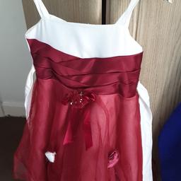 This dress is for weddings. There is a little stain at the back of the dress. Age 1/2  years. luton based. COLLECTION ONLY PLEASE