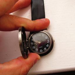 fully working watch modifyed a copple years back in to an apron / pin on watch