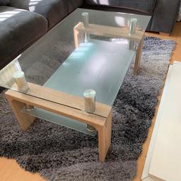 Glass coffee table, oak wood. 
In great condition. Moving homes and downsizing reason for selling 
Collect 
Oldham 
Great price 
Contact 07803468134
