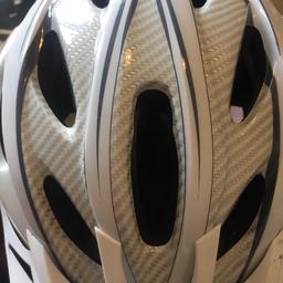White bicycle helmet which light which works