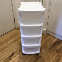 White plastic storage drawers. Measurements- H 82.3cm, W 32cm, D 36.5cm. In great condition. £5 COLLECTION ONLY.