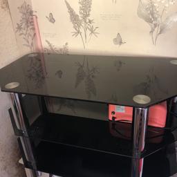 Black glass tv stand good condition holds up to a 50” tv please only make the offer if willing to collect due to item been relisted. Need gone within the next few days 