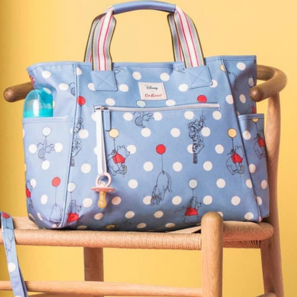 Button spot carry store all nappy bag