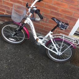 Girls bike with basket and bell excellent condition like new age 8+