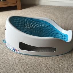 Excellent bath seat perfect for supporting babies in the water. The little holes ensure the baby stays warm. From a pet and smoke free home. In great condition!
