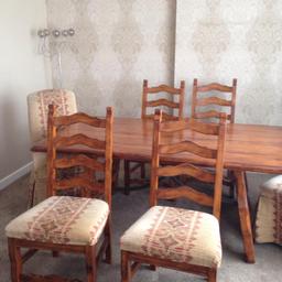 Large solid oak wood table and 6 chairs for sale good condition table has slight wear