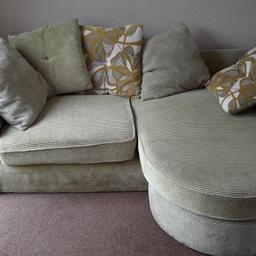 3 seater sofa in New Ollerton. This was already in house when i moved and is surplus to requirements. Has small hole in black lining under seat cushion but doesn't affect the use of the sofa. suitable for dog sofa or kids play room etc. faded like green but been used with throws. buyer removes, thanks