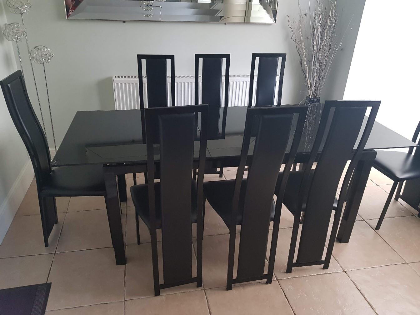 Harvey s black glass extending table 8chairs in Cannock Chase for 200.00 for sale Shpock
