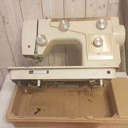 old portable sewing machine for sale...excellent condition.