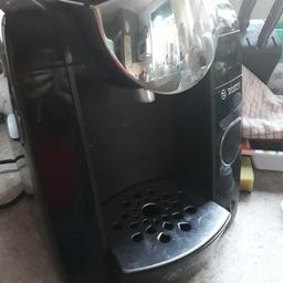 excellent working condition, cleaned regularly. this model accepts brita filters but doesnt come with one. comes with pod stand and plenty of cappuccino pods.