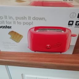 brand new toaster in red
