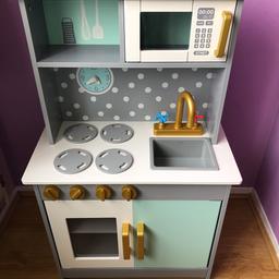 A wooden play kitchen ideal for children to have fun in the house. Strong and durable so it would less likely to break. Fitted already with cupboards and ovens. Been used for less than 2 weeks but completely new.Original price was £40 but selling for a lot cheaper! ACCESSORIES NOT INCLUDING, eg; pots , cutlery etc
