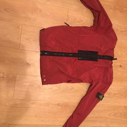 Brand new stone island jacket 
burgundy 
XL 
Selling due to wrong size 
£100 ono