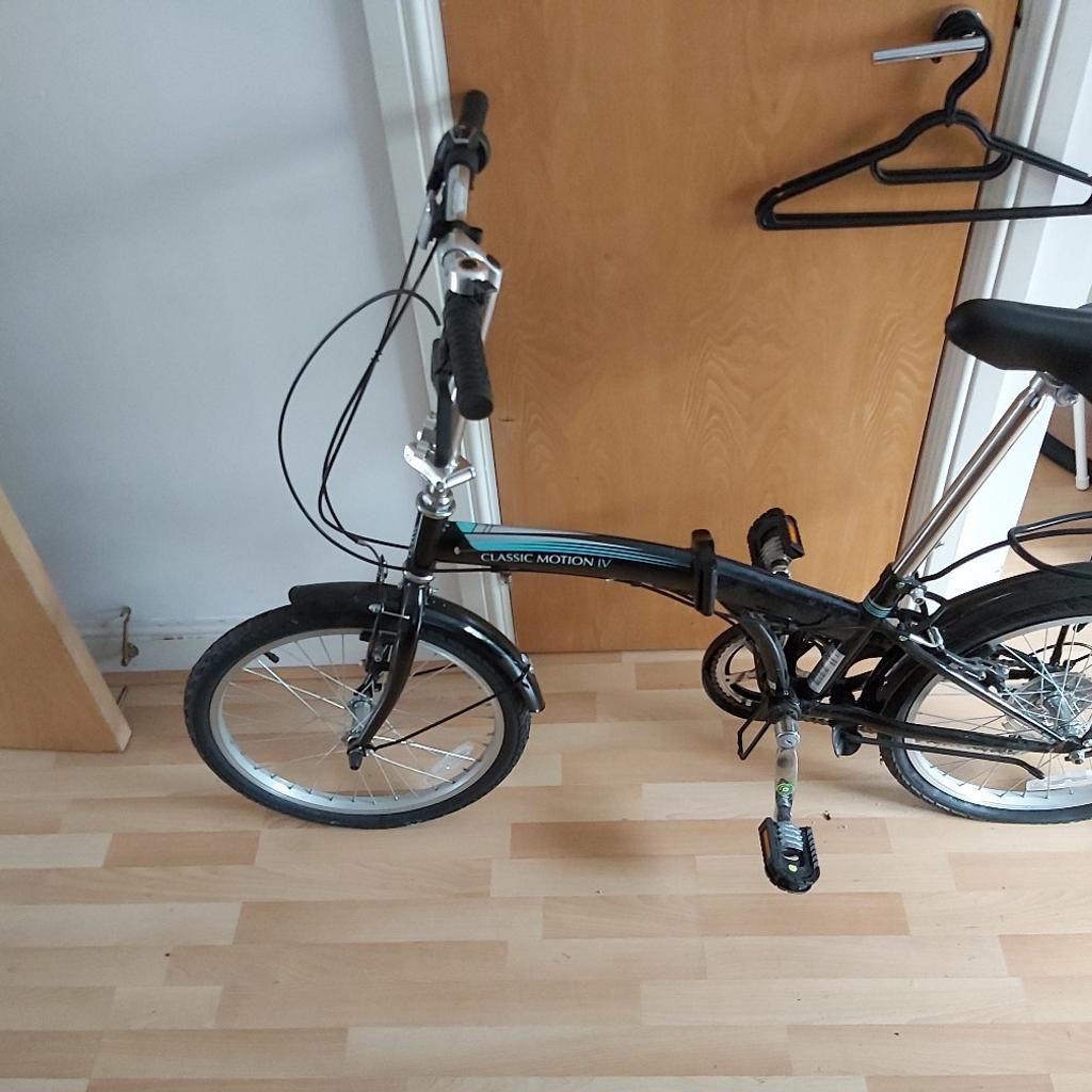 Classic motion iv store folding bike