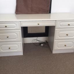 Wooden white  dressing table with lots of drawers 
Very good condition 
Width 145 cm 
Height 70 cm 
Depth 46 cm 
Selling as moving house 
Collection only from Amen corner /sw17 
Thanks