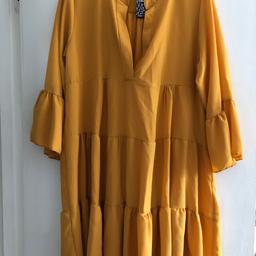 BNWT
Mustard Dress with bell sleeves 
One Size (Fits upto Size 14/16)

Collection or can post for additional cost