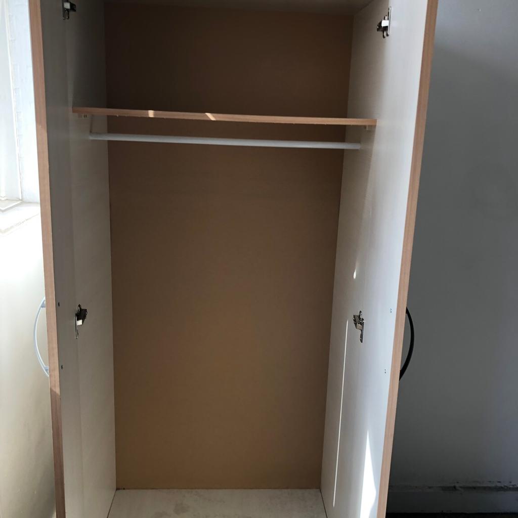 2 door white wardrobe with shelf and rail in E4 London for £15.00 for ...