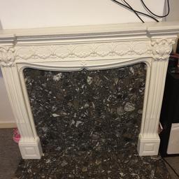 white fireplace surround.
Black/grey inset and matching hearth.

one pen mark on the surround.
bottom left corner has been fixed but is unnoticeable.

hight: 113cm
width: 124cm
depth: 41cm

collection by Saturday 14th September from rm10.
item is very heavy will need two people to collect.