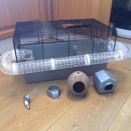 Includes water bottle, food bowl, house and coconut house.

In excellent condition

From a smoke free home

Collection is from Quedgeley