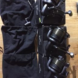 All reels in great condition and quick drag works as it should. Very low use and all three are loaded with 15lb sub line. Come with boxes, soft cases and owners manuals. One of the reels has a brand new spare handle.
