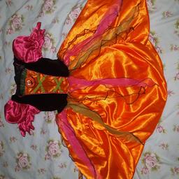 there are a few pulls to the front orange panel and the velcro has pulled a bit on the back, from Next aged 5-6, lovely orange satin type skirt 
collection ll144hq