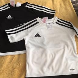 Bought for my daughter to play football which she only did once or twice before getting bored white tops has marks on yet black one is pristine but thought I’d throw the white one in with it incase someone would like it . Please see my other items all come from an immaculate smoke and pet free home . Happy to post if buyer pays postage .