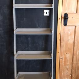 Ladder bookcase - grey 
Some small marks as shown in picture. 
Rests against the wall, no need to fix to the wall, but you can if you want. Pet and smoke free home.

55cm wide
177cm tall 
36cm depth at widest bottom shelf.
