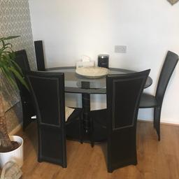 glass dining table and 4 chairs