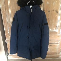 Navy parka coat . Age 14 
From next . Really thick coat . Great condition. Smoke free home 
Collection Ashtead Surrey