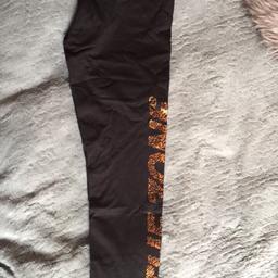 Full length leggings bought from New Look.
Size MEDIUM and SMALL. 
Print says 'In the zone' and is printed on the lower right leg.
Has not been used and thus great condition.
£7 each or both for £10 