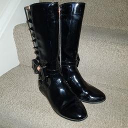 Riding style Ted Baker boots. With frill up the side and bow. Used but in good condition. RRP £50.